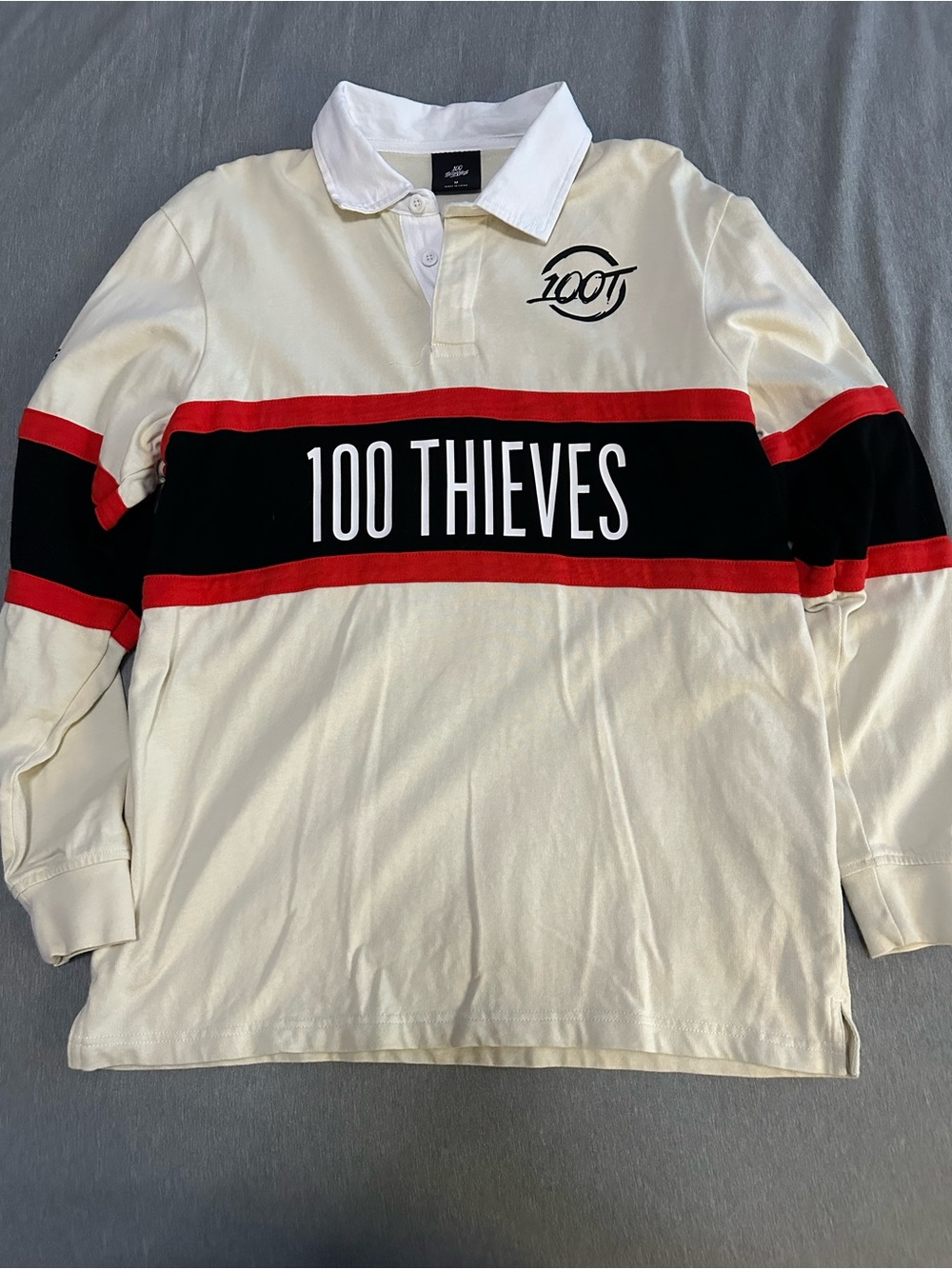 100 Thieves Men's Cream Rugby Shirt with Black & Red Stripe